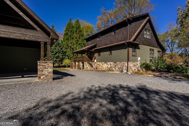2778 Kelly Ln, Hiawassee, GA 30546 - view of home's exterior with stairway and stone siding