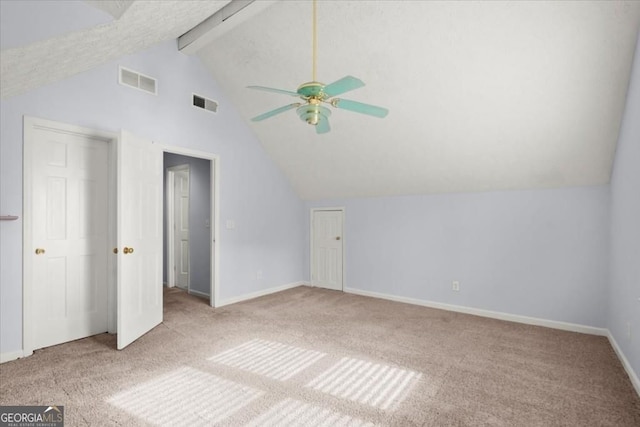 additional living space featuring ceiling fan, carpet flooring, vaulted ceiling with beams, and visible vents