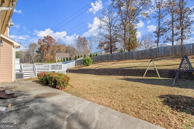 view of yard with a patio area and a fenced backyard