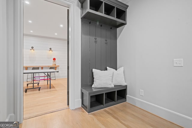 mudroom featuring wood finished floors, recessed lighting, and baseboards