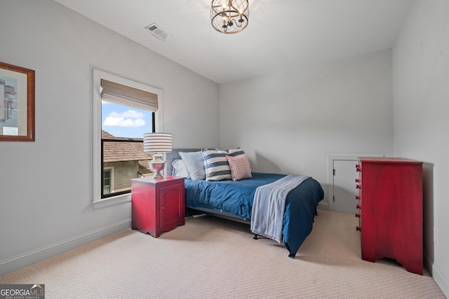 carpeted bedroom featuring baseboards