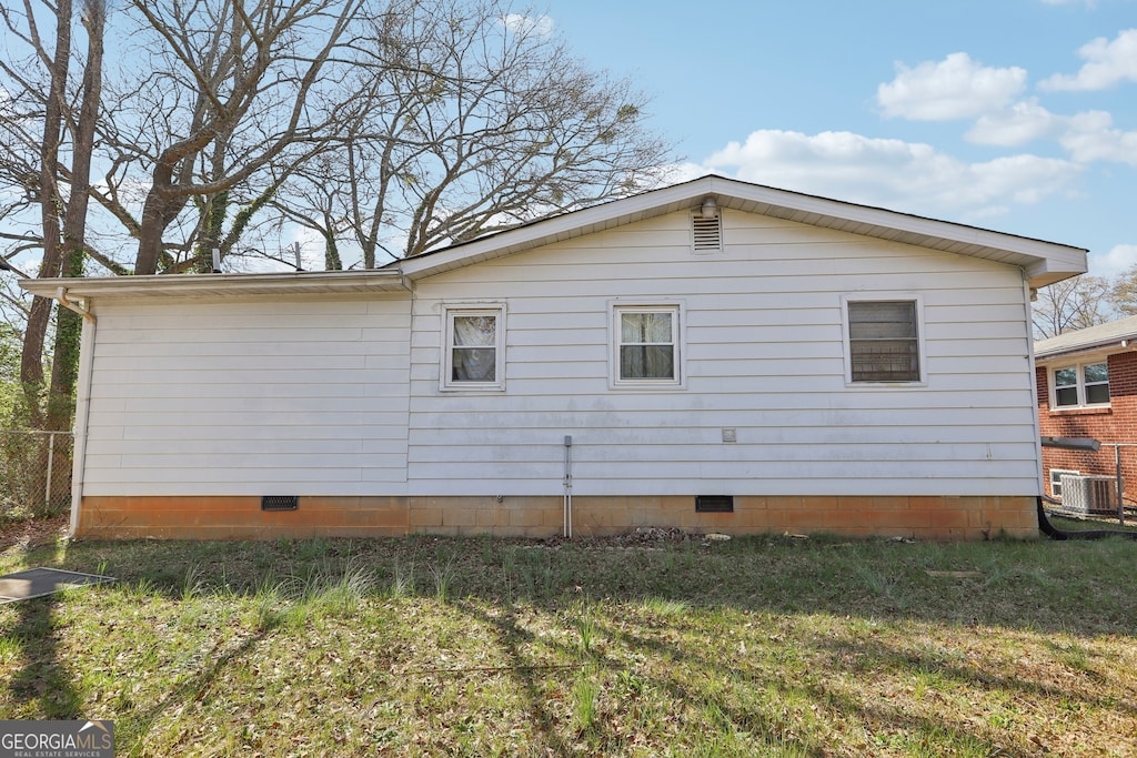 340 Brooks Ave SW, Atlanta, GA 30310 - view of home's exterior featuring crawl space, a yard, and cooling unit