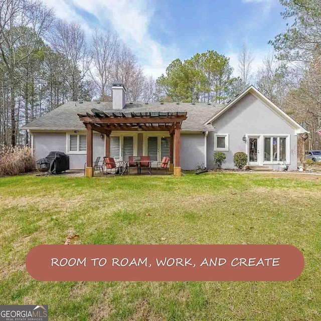 4751 Bill Cheek Rd, Auburn, GA 30011 - rear view of house featuring a pergola, a chimney, a lawn, and stucco siding