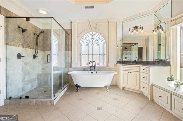 full bathroom featuring crown molding, visible vents, and a stall shower