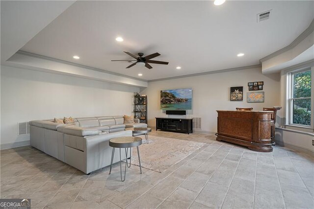 living area featuring recessed lighting, ceiling fan, and ornamental molding