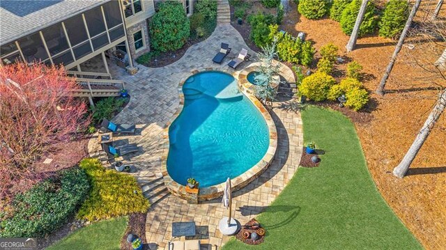 pool featuring a patio area