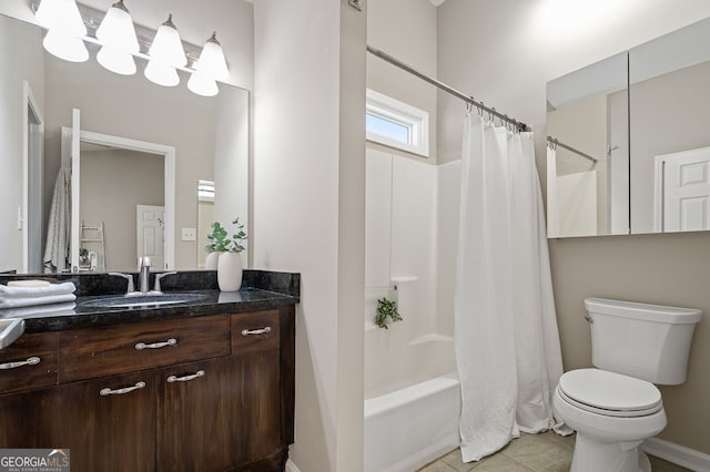 full bathroom with vanity, tile patterned floors, toilet, and shower / tub combo with curtain