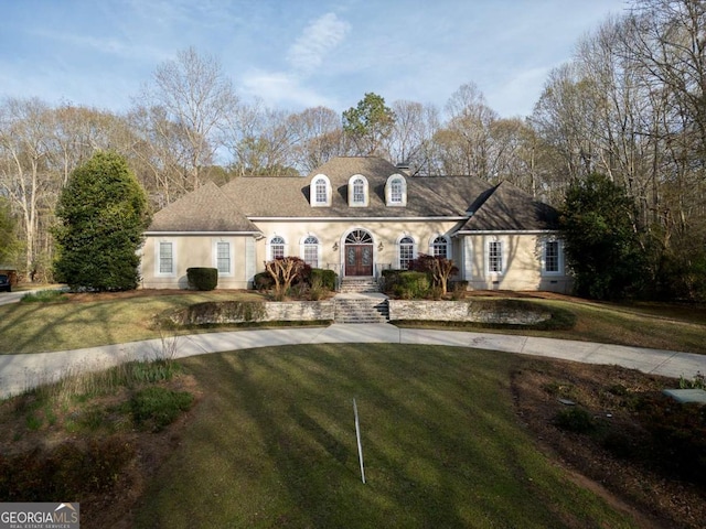 1281 Tanglebrook Dr, Athens, GA 30606 - cape cod house with stucco siding and a front yard