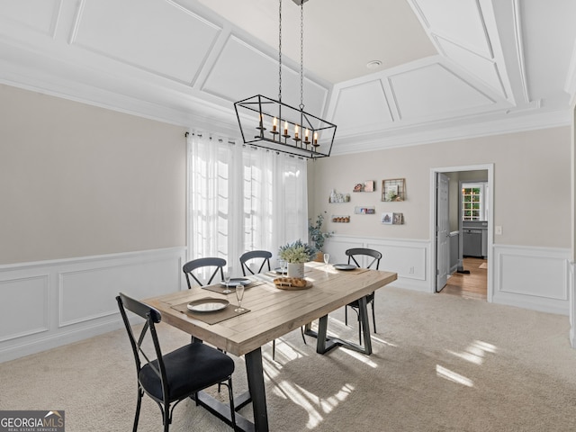152 Vinings Lake Ct SW, Mableton, GA 30126 - dining area with a decorative wall, an inviting chandelier, wainscoting, and light colored carpet