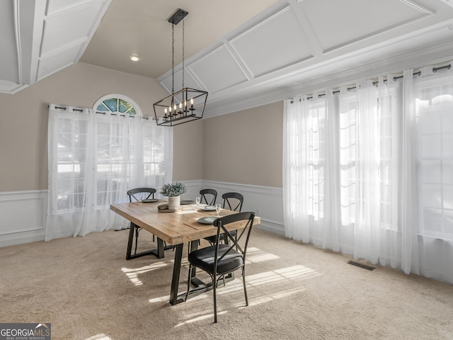 152 Vinings Lake Ct SW, Mableton, GA 30126 - dining area with carpet flooring, a wainscoted wall, lofted ceiling, and visible vents