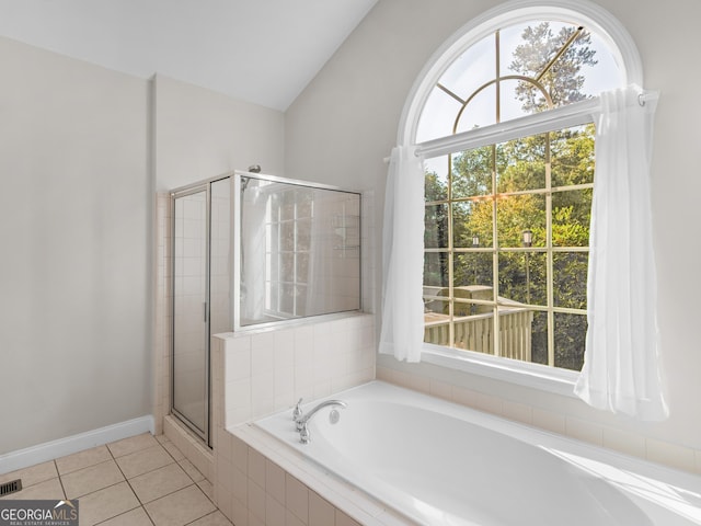 152 Vinings Lake Ct SW, Mableton, GA 30126 - bathroom with a stall shower, vaulted ceiling, tile patterned flooring, a bath, and visible vents