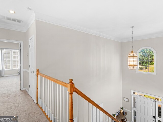 152 Vinings Lake Ct SW, Mableton, GA 30126 - interior space featuring an upstairs landing, crown molding, a healthy amount of sunlight, and carpet