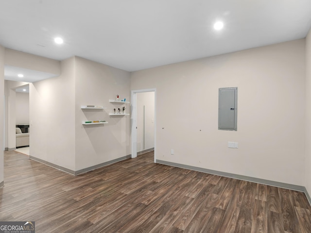 152 Vinings Lake Ct SW, Mableton, GA 30126 - unfurnished living room with electric panel, baseboards, wood finished floors, and recessed lighting