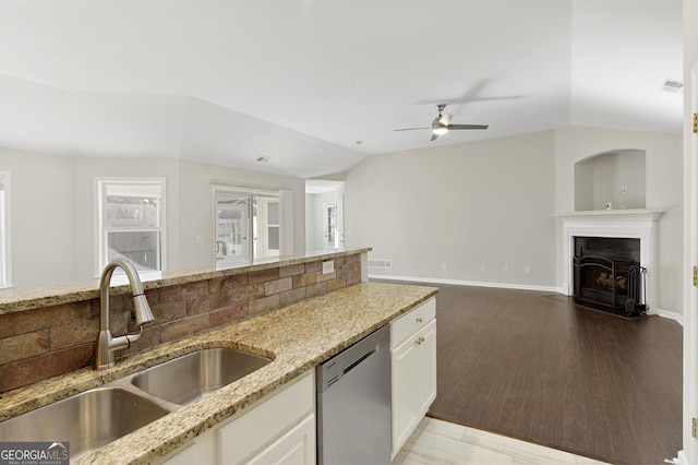 4071 Cottage Oaks Dr Unit 3, Acworth, GA 30101 - kitchen featuring dishwasher, a sink, ceiling fan, vaulted ceiling, and light stone countertops