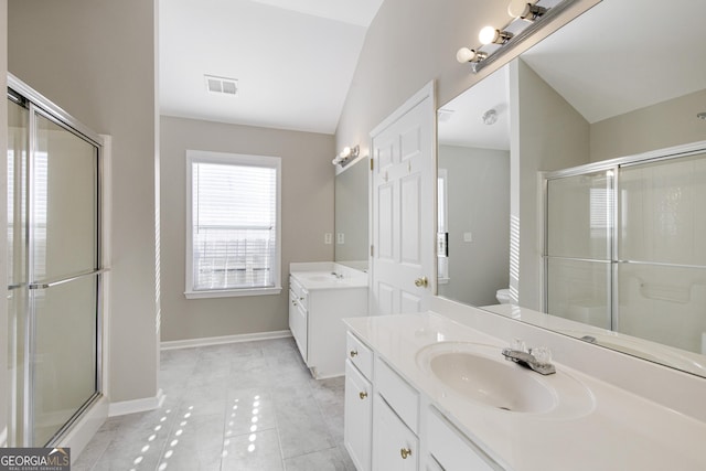4071 Cottage Oaks Dr Unit 3, Acworth, GA 30101 - bathroom featuring two vanities, a stall shower, baseboards, tile patterned flooring, and lofted ceiling