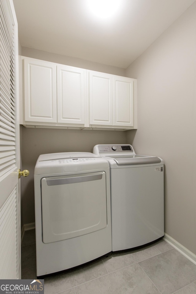 4071 Cottage Oaks Dr Unit 3, Acworth, GA 30101 - laundry area featuring cabinet space, independent washer and dryer, baseboards, and light tile patterned flooring