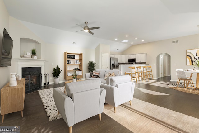 4071 Cottage Oaks Dr Unit 3, Acworth, GA 30101 - living area with arched walkways, lofted ceiling, a ceiling fan, a fireplace with flush hearth, and recessed lighting