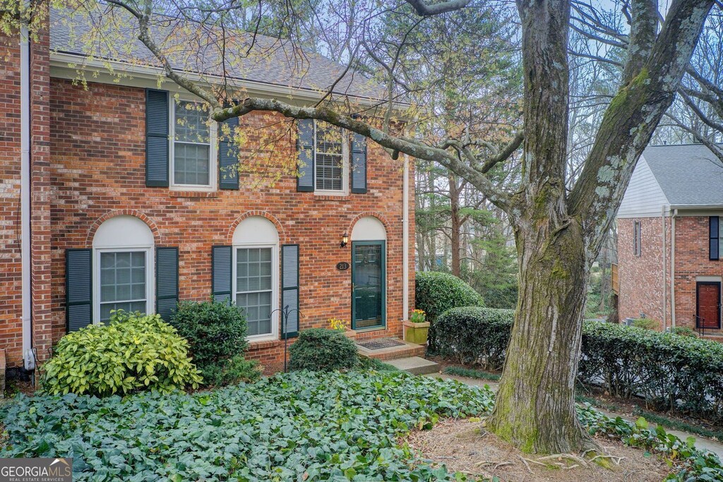 213 The S Chace NE, Sandy Springs, GA 30328 - colonial-style house featuring brick siding