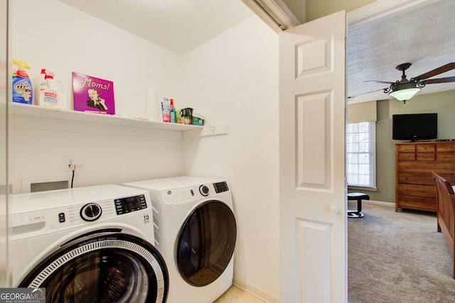 laundry room with carpet, laundry area, a ceiling fan, baseboards, and separate washer and dryer