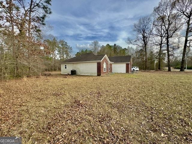 5555 Carlton Ln, Garfield, GA 30425 - view of property exterior featuring brick siding