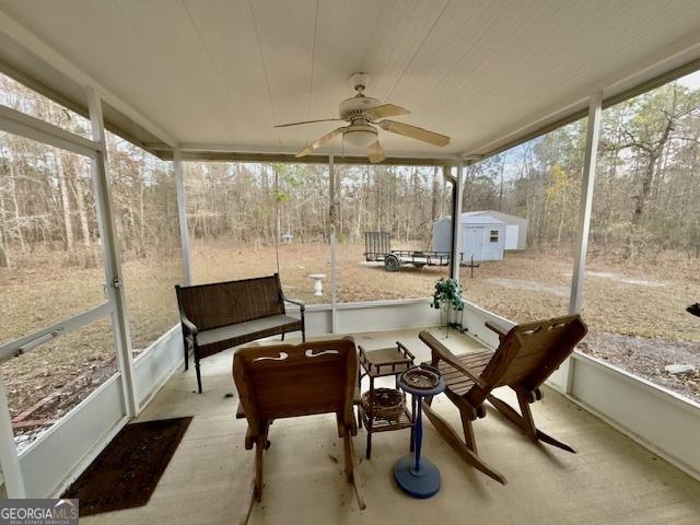 5555 Carlton Ln, Garfield, GA 30425 - sunroom with a ceiling fan and plenty of natural light