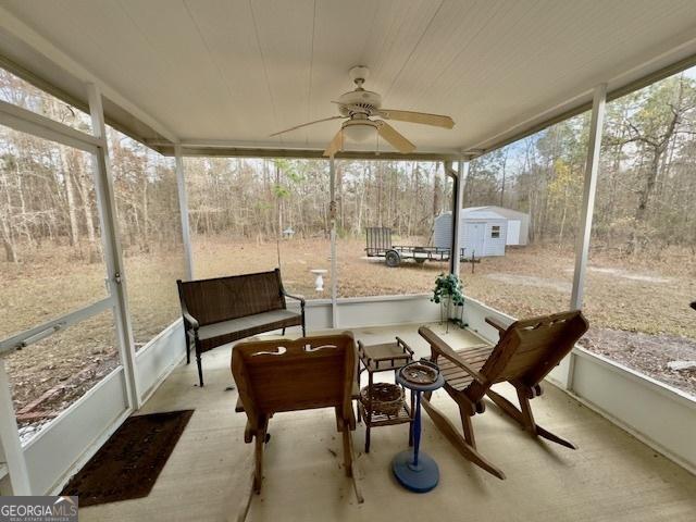 5555 Carlton Ln, Garfield, GA 30425 - sunroom featuring ceiling fan