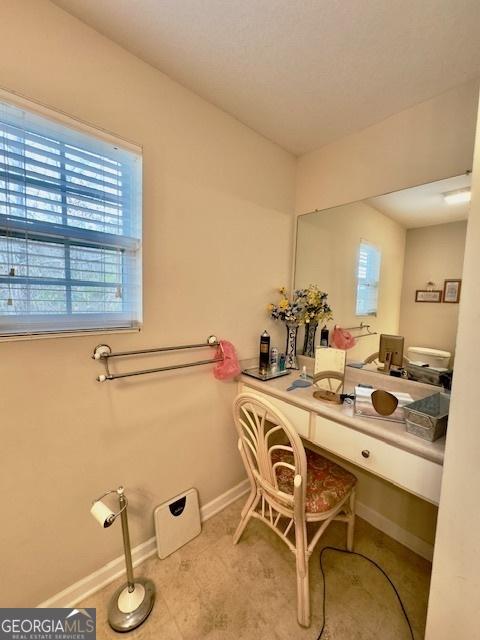 5555 Carlton Ln, Garfield, GA 30425 - bathroom with baseboards and vanity