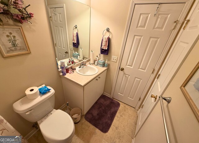 5555 Carlton Ln, Garfield, GA 30425 - bathroom with toilet and vanity