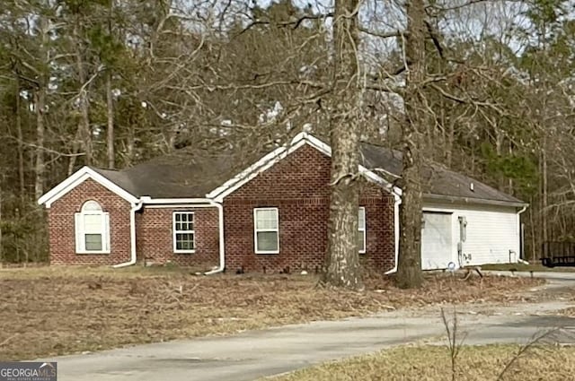 5555 Carlton Ln, Garfield, GA 30425 - view of front facade with brick siding