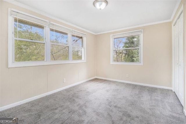 3409 Glensford Dr, Decatur, GA 30032 - carpeted spare room featuring baseboards and crown molding