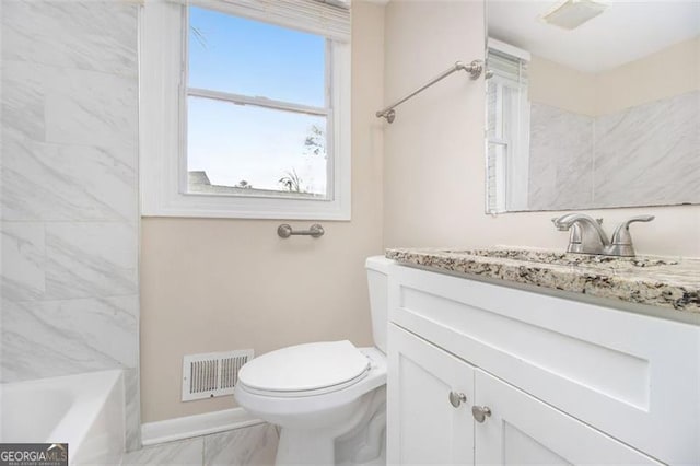 3409 Glensford Dr, Decatur, GA 30032 - full bath with visible vents, toilet, and vanity