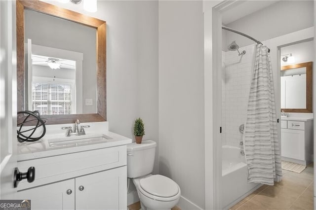 bathroom featuring toilet, shower / tub combo, tile patterned flooring, a ceiling fan, and vanity