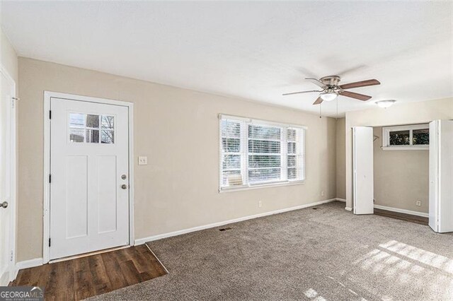 2203 Knoll Dr, Decatur, GA 30032 - entrance foyer with baseboards, ceiling fan, and carpet floors