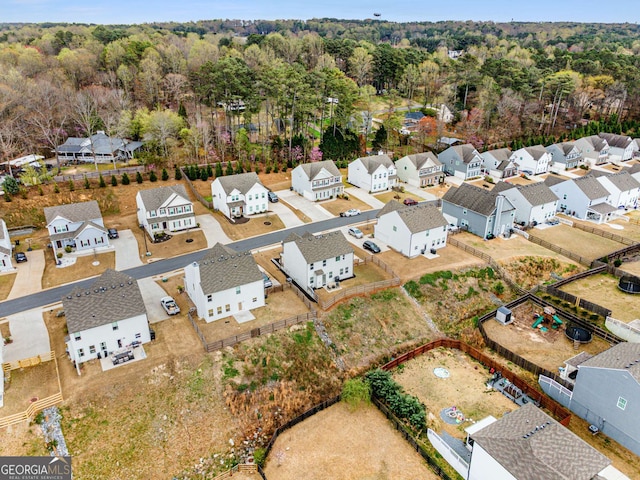 aerial view featuring a residential view and a forest view