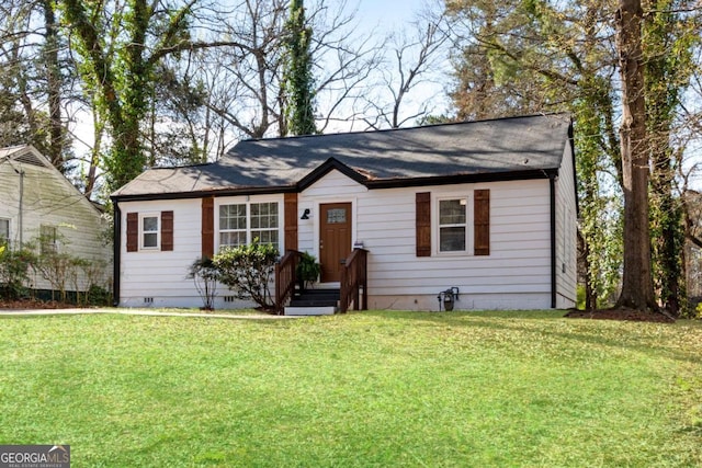 view of front of property with a front lawn and crawl space