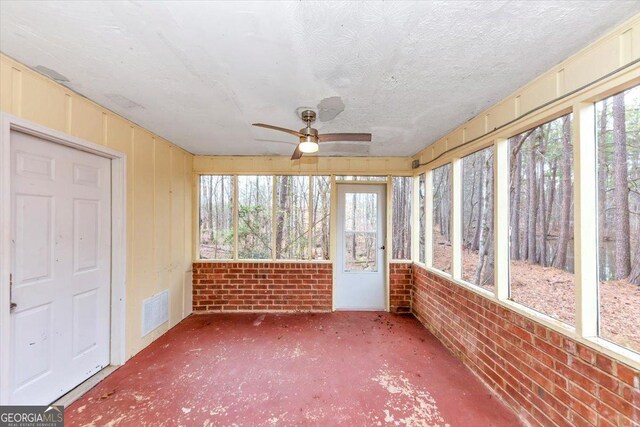 1736 Salem Woods Dr SE, Conyers, GA 30013 - unfurnished sunroom featuring visible vents and ceiling fan