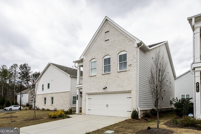 3739 Silvery Way, Powder Springs, GA 30127 - view of home's exterior with brick siding, an attached garage, and driveway