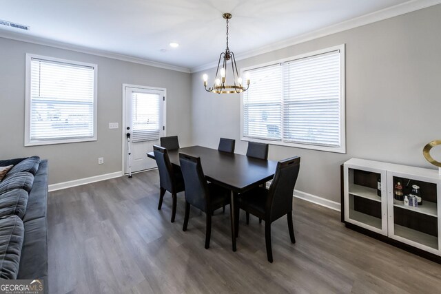 3739 Silvery Way, Powder Springs, GA 30127 - dining area with visible vents, baseboards, an inviting chandelier, and ornamental molding