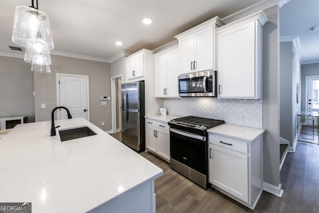 3739 Silvery Way, Powder Springs, GA 30127 - kitchen with tasteful backsplash, visible vents, ornamental molding, appliances with stainless steel finishes, and a sink