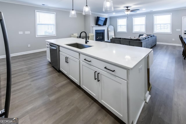 3739 Silvery Way, Powder Springs, GA 30127 - kitchen featuring dishwasher, ornamental molding, a fireplace, and a sink