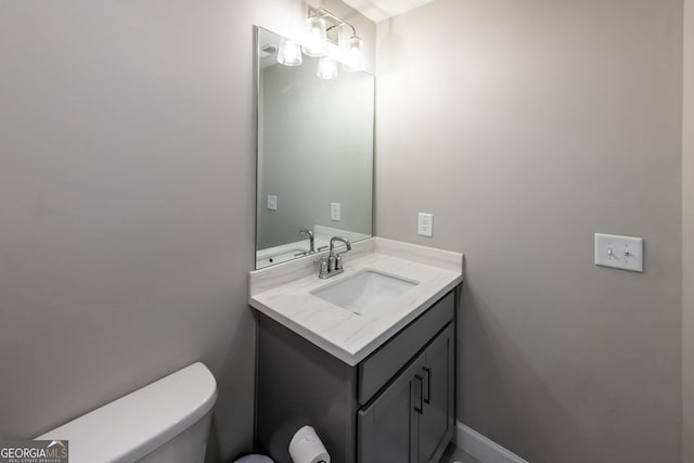 3739 Silvery Way, Powder Springs, GA 30127 - bathroom with baseboards, toilet, and vanity