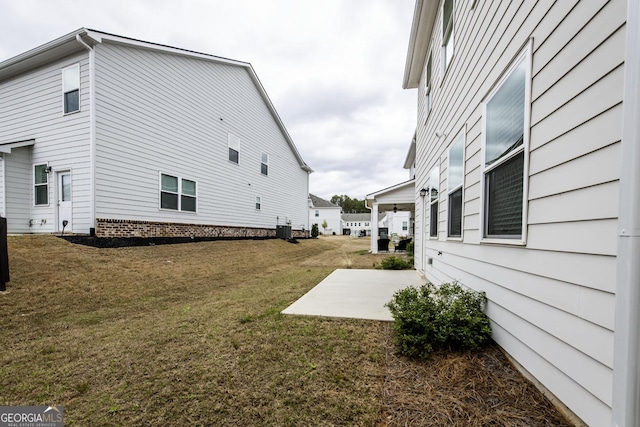 3739 Silvery Way, Powder Springs, GA 30127 - exterior space with a patio area, central air condition unit, and a yard