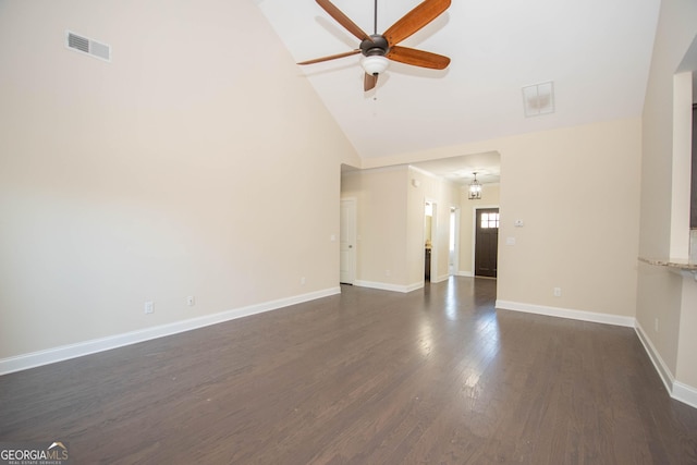 39 Chatham Ct, Williamson, GA 30292 - unfurnished living room with dark wood finished floors, visible vents, baseboards, high vaulted ceiling, and ceiling fan