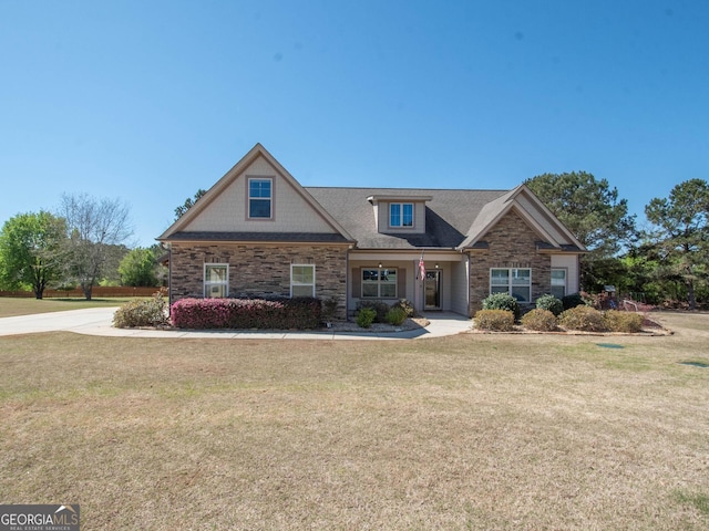 39 Chatham Ct, Williamson, GA 30292 - craftsman-style home featuring stone siding and a front yard