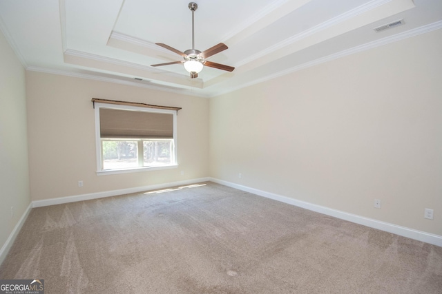 39 Chatham Ct, Williamson, GA 30292 - unfurnished room featuring ceiling fan, crown molding, visible vents, and a raised ceiling