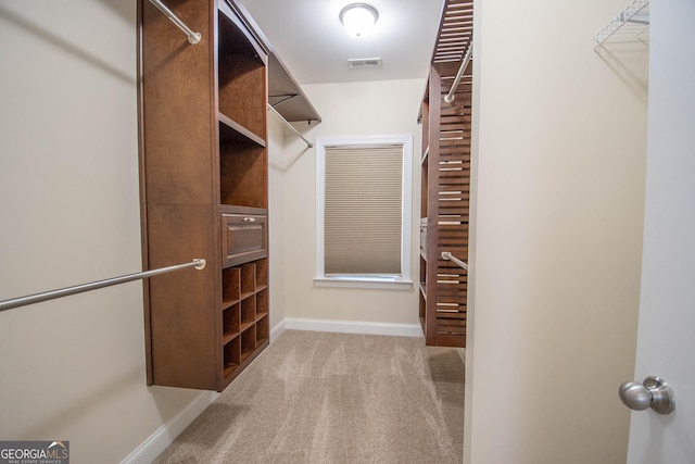 39 Chatham Ct, Williamson, GA 30292 - walk in closet featuring visible vents and carpet flooring