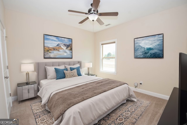 39 Chatham Ct, Williamson, GA 30292 - bedroom featuring baseboards, visible vents, light colored carpet, and ceiling fan