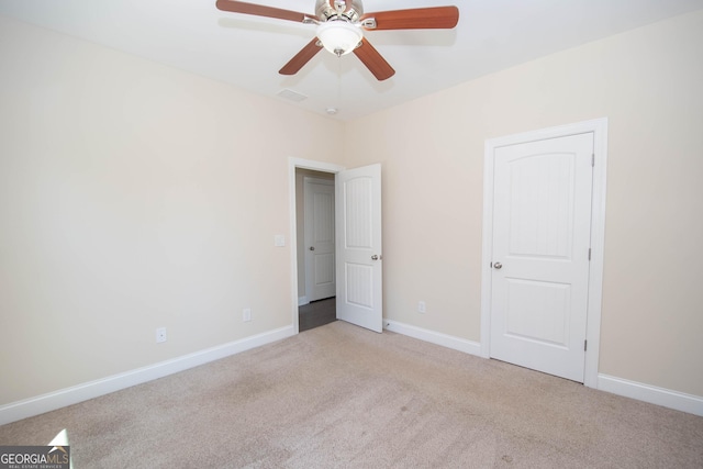 39 Chatham Ct, Williamson, GA 30292 - unfurnished bedroom featuring visible vents, carpet flooring, baseboards, and ceiling fan