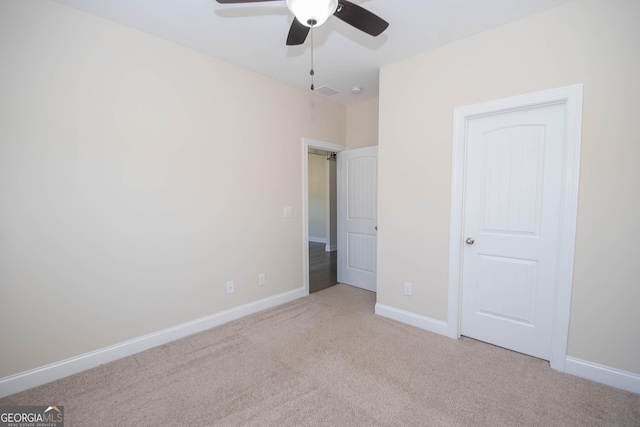 39 Chatham Ct, Williamson, GA 30292 - unfurnished bedroom with visible vents, a ceiling fan, baseboards, and carpet floors