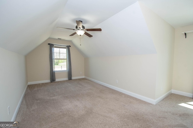 39 Chatham Ct, Williamson, GA 30292 - additional living space featuring vaulted ceiling, baseboards, carpet floors, and a ceiling fan